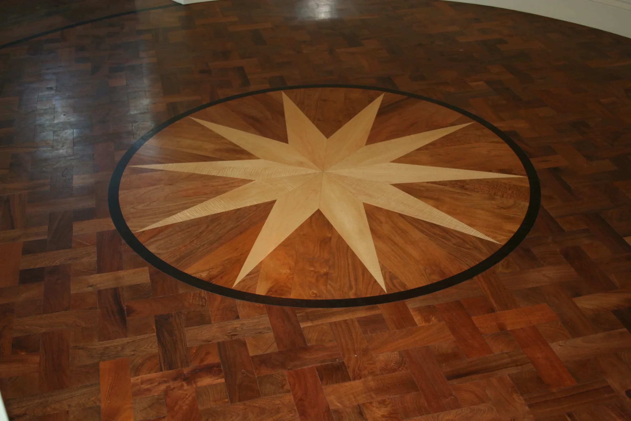 Mesquite basketweave parquet floor with custom compass medallion inlay by ACE Hardwood